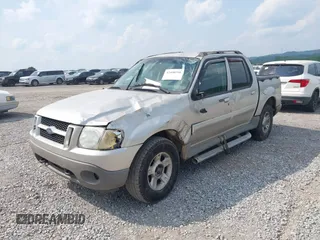 2003 Ford Explorer Sport Trac XLS z VIN 1FMZU77E73UB97392, wystawiony jako IAAI lot #42400398 z przebiegiem 160 556 mil mil oraz . Historia ofert i sprzedaży dostępna na DreamBid. Obrazek 2.