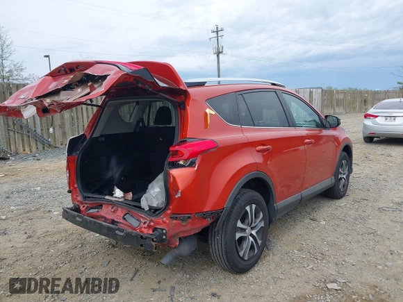 2016 Toyota RAV4 LE with VIN 2T3BFREV6GW516014, listed as a IAAI auction lot 41940997 with 74,129 mi miles. Bid and sale history available at carsss.com. Image 4.