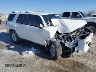 2018 Toyota 4Runner SR5 with VIN JTEBU5JR7J5571251, listed as a Copart auction lot 87005284 with 162,986 mi miles and Salvage Title. Bid and sale history available at carsss.com. Image 4.