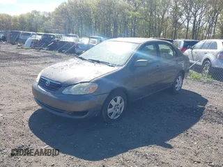 2005 Toyota Corolla CE with VIN 2T1BR30E55C400130, listed as a IAAI auction lot 42164407 with Not provided miles and . Bid and sale history available at DreamBid. Image 2.