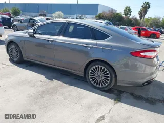 2013 Ford Fusion Titanium with VIN 3FA6P0K98DR216885, listed as a IAAI auction lot 41838680 with 164,182 mi miles. Bid and sale history available at carsss.com. Image 3.