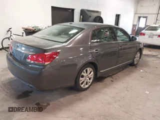 2011 Toyota Avalon with VIN 4T1BK3DB6BU432597, listed as a IAAI auction lot 41625819 with 233,536 mi miles and . Bid and sale history available at DreamBid. Image 4.