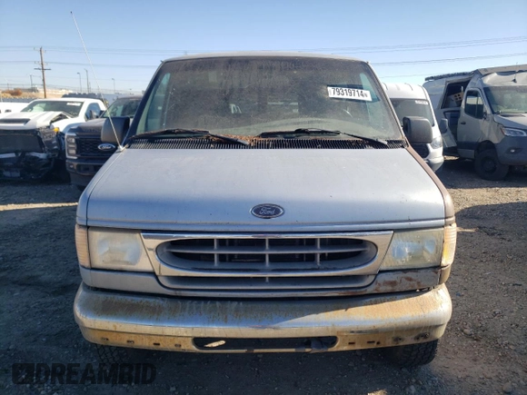 1999 Ford Econoline Passenger XL with VIN 1FBSS31L6XHB60672, listed as a Copart auction lot 79319714 with 295,551 mi miles and Clean Title. Bid and sale history available at DreamBid. Image 5.