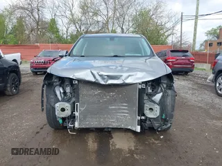 2021 Chevrolet Traverse LT Cloth z VIN 1GNERGKW3MJ157258, wystawiony jako IAAI lot #42169401 z przebiegiem 34 992 mil mil oraz . Historia ofert i sprzedaży dostępna na DreamBid. Obrazek 13.