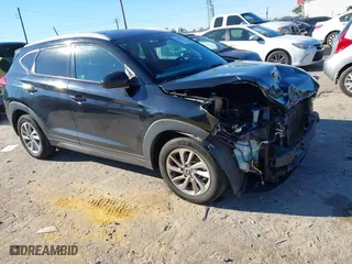 2016 Hyundai Tucson SE with VIN KM8J3CA4XGU039773, listed as a IAAI auction lot 41295718 with 161,209 mi miles. Bid and sale history available at carsss.com. Image 1.
