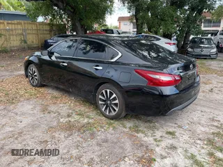 2018 Nissan Altima S with VIN 1N4AL3APXJC195152, listed as a IAAI auction lot 42196836 with 159,552 mi miles and . Bid and sale history available at DreamBid. Image 3.