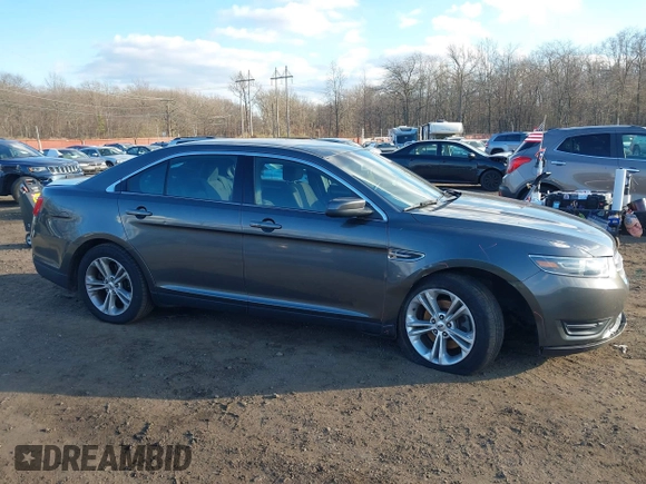 2015 Ford Taurus SEL with VIN 1FAHP2H86FG174102, listed as a IAAI auction lot 40997366 with 132,543 mi miles. Bid and sale history available at carsss.com. Image 13.