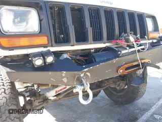 1997 Jeep Cherokee SE with VIN 1J4FJ28S7VL553270, listed as a IAAI auction lot 41825524 with 157,015 mi miles. Bid and sale history available at carsss.com. Image 17.