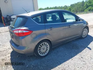 2013 Ford C-Max SEL z VIN 1FADP5BU8DL545447, wystawiony jako IAAI lot #42327754 z przebiegiem 335 658 mil mil oraz . Historia ofert i sprzedaży dostępna na DreamBid. Obrazek 4.
