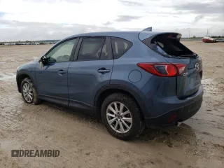 2016 Mazda CX-5 Touring with VIN JM3KE2CY4G0882671, listed as a Copart auction lot 51089555 with 50,951 mi miles and Salvage Title. Bid and sale history available at carsss.com. Image 2.