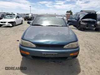 1996 Toyota Camry LE with VIN 4T1BF12K5TU861825, listed as a Copart auction lot 59803174 with 217,650 mi miles and Salvage title. Bid and sale history available at DreamBid. Image 5.