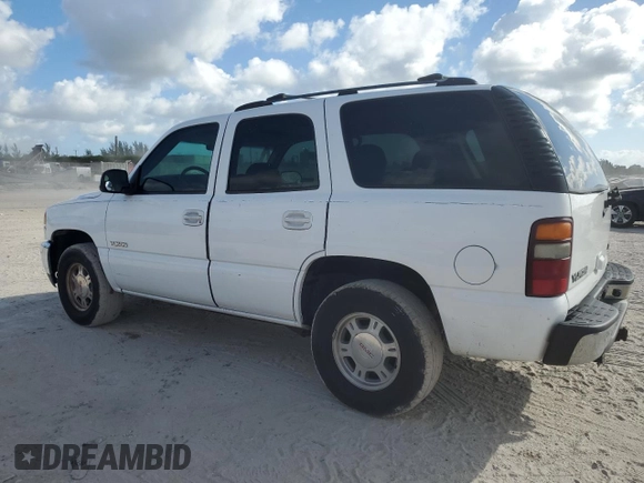 2002 GMC Yukon SLT with VIN 1GKEC13V12R196673, listed as a Copart auction lot 44921005 with 217,403 mi miles and Salvage Title. Bid and sale history available at carsss.com. Image 2.