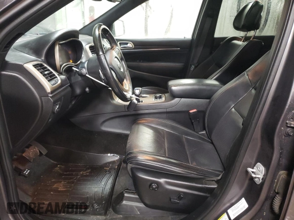 2015 Jeep Grand Cherokee Overland with VIN 1C4RJFCT2FC613502, listed as a Copart auction lot 89207005 with 124,482 mi miles and Salvage Title. Bid and sale history available at carsss.com. Image 7.