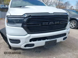 2023 Ram 1500 Laramie with VIN 1C6SRFJT8PN520610, listed as a IAAI auction lot 41898526 with 23,605 mi miles and . Bid and sale history available at DreamBid. Image 6.