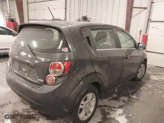 2015 Chevrolet Sonic LT with VIN 1G1JC6SGXF4205148, listed as a IAAI auction lot 41591559 with 144,048 mi miles. Bid and sale history available at carsss.com. Image 4.