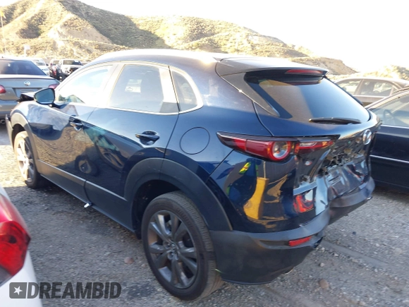 2023 Mazda CX-30 S Select with VIN 3MVDMBBM8PM514475, listed as a IAAI auction lot 41664456 with 33,076 mi miles and . Bid and sale history available at DreamBid. Image 3.