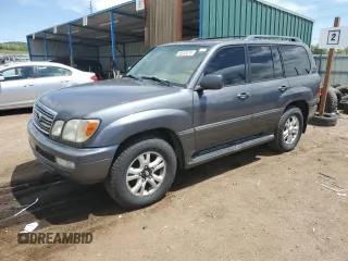 2004 Lexus LX 470 z VIN JTJHT00W743541854, wystawiony jako Copart lot #58053475 z przebiegiem 311 296 mil mil oraz Tytuł czysty. Historia ofert i sprzedaży dostępna na DreamBid. Obrazek 1.