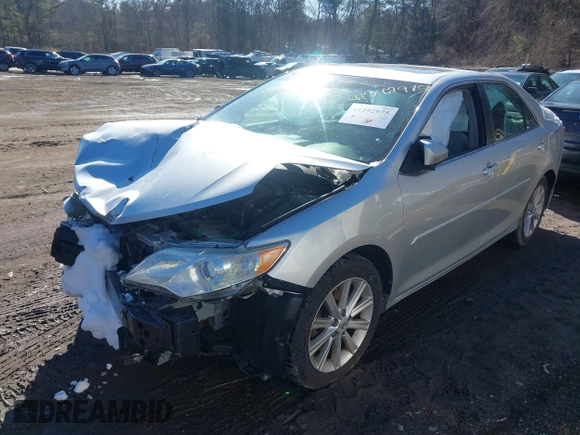 2014 Toyota Camry SE with VIN 4T1BK1FK6EU548176, listed as a IAAI auction lot 41392975 with 143,249 mi miles. Bid and sale history available at carsss.com. Image 17.