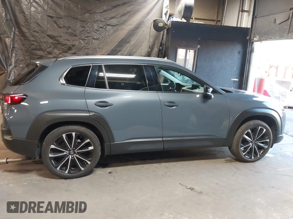 2023 Mazda CX-50 S Premium Plus with VIN 7MMVABEM3PN108555, listed as a IAAI auction lot 41202257 with 21,258 mi miles and . Bid and sale history available at DreamBid. Image 13.