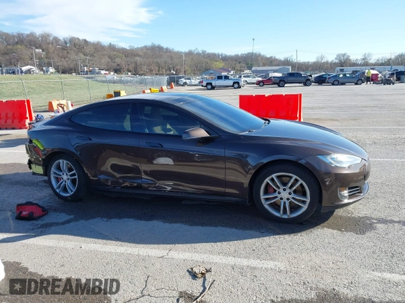 2014 Tesla Model S 60 with VIN 5YJSA1H17EFP33275, listed as a IAAI auction lot 41778167 with 202,749 mi miles and . Bid and sale history available at DreamBid. Image 13.