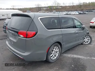 2020 Chrysler Pacifica Touring with VIN 2C4RC1FG3LR245765, listed as a IAAI auction lot 42069689 with 40,869 mi miles and . Bid and sale history available at DreamBid. Image 4.