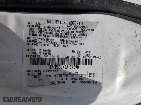 2006 Ford Taurus SE with VIN 1FAFP53UX6A194398, listed as a Copart auction lot 59582515 with 114,933 mi miles and Salvage title. Bid and sale history available at DreamBid. Image 12.