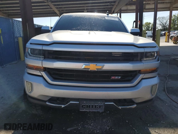 2017 Chevrolet Silverado 1500 LT with VIN 3GCUKREC0HG470703, listed as a Copart auction lot 53667145 with 167,689 mi miles and Salvage Title. Bid and sale history available at DreamBid. Image 5.