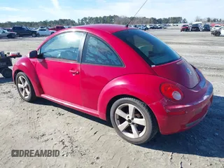 2006 Volkswagen New Beetle Coupe with VIN 3VWSW31C56M403105, listed as a IAAI auction lot 41396362 with 157,213 mi miles. Bid and sale history available at carsss.com. Image 3.