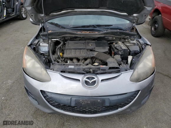 2012 Mazda Mazda2 Sport with VIN JM1DE1KZ2C0147560, listed as a Copart auction lot 71663534 with 168,798 mi miles and Salvage Title. Bid and sale history available at carsss.com. Image 11.