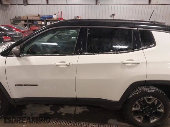 2018 Jeep Compass Trailhawk with VIN 3C4NJDDB2JT328269, listed as a IAAI auction lot 41597957 with 66,789 mi miles and . Bid and sale history available at carsss.com. Image 14.