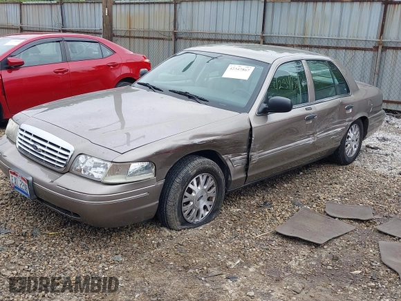 2004 Ford Crown Victoria LX z VIN 2FAFP74W74X114961, wystawiony jako IAAI lot #42347867 z przebiegiem 170 867 mil mil oraz . Historia ofert i sprzedaży dostępna na DreamBid. Obrazek 17.