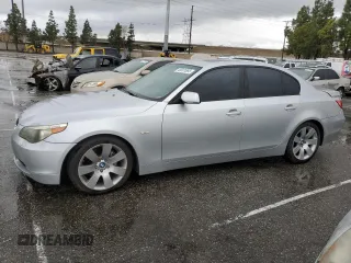 2007 BMW 5 Series 530i with VIN WBANE73537CM46544, listed as a Copart auction lot 48601695 with 173,961 mi miles and Salvage Title. Bid and sale history available at carsss.com. Image 1.