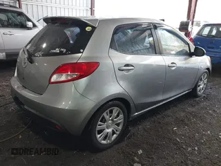 2013 Mazda 2 Sport with VIN JM1DE1KY1D0167999, listed as a IAAI auction lot 41713546 with 204,443 mi miles and . Bid and sale history available at DreamBid. Image 4.