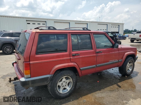 1999 Jeep Cherokee Sport with VIN 1J4FT68SXXL669549, listed as a Copart auction lot 62367015 with 194,446 mi miles and Salvage title. Bid and sale history available at DreamBid. Image 3.