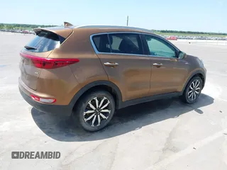 2017 Kia Sportage EX with VIN KNDPNCAC8H7264788, listed as a IAAI auction lot 42513924 with 166,239 mi miles and . Bid and sale history available at DreamBid. Image 4.