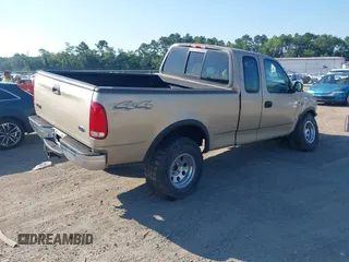 2000 Ford F-150 XL z VIN 1FTRX18W7YNA73804, wystawiony jako IAAI lot #42779753 z przebiegiem 228 666 mil mil oraz . Historia ofert i sprzedaży dostępna na DreamBid. Obrazek 4.