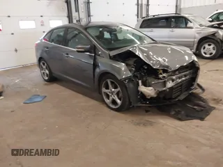 2013 Ford Focus Titanium with VIN 1FADP3J23DL265049, listed as a IAAI auction lot 41765621 with 100,550 mi miles and . Bid and sale history available at carsss.com. Image 1.