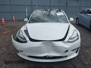 2020 Tesla Model 3 Long Range with VIN 5YJ3E1EB6LF618931, listed as a IAAI auction lot 41867451 with 47,502 mi miles and . Bid and sale history available at DreamBid. Image 12.