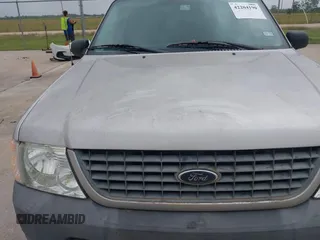 2004 Ford Explorer XLS z VIN 1FMZU62K74UC37365, wystawiony jako IAAI lot #42204190 z przebiegiem 144 350 mil mil oraz . Historia ofert i sprzedaży dostępna na DreamBid. Obrazek 6.