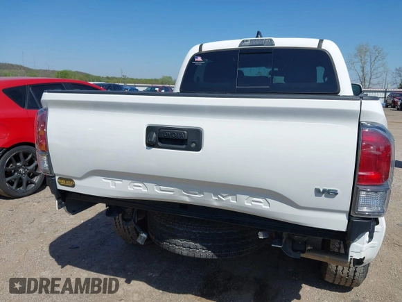 2023 Toyota Tacoma SR z VIN 3TYCZ5AN5PT151681, wystawiony jako IAAI lot #41936577 z przebiegiem 30 056 mil mil oraz . Historia ofert i sprzedaży dostępna na DreamBid. Obrazek 17.