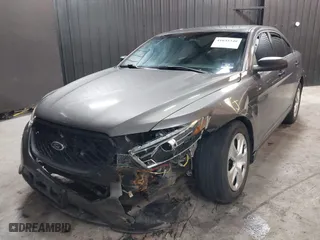 2015 Ford Sedan Police Interceptor with VIN 1FAHP2MK4FG119536, listed as a IAAI auction lot 41635340 with 165,322 mi miles. Bid and sale history available at carsss.com. Image 19.