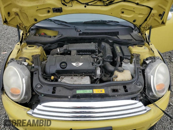 2011 MINI Hardtop with VIN WMWSU3C58BTX96968, listed as a Copart auction lot 62560915 with 88,616 mi miles and Salvage title. Bid and sale history available at DreamBid. Image 11.
