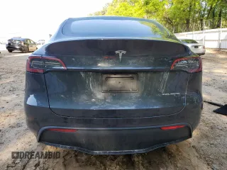 2024 Tesla Model Y Long Range с VIN 7SAYGDEE9RA230998, выставлен на аукционе Copart как лот 51682025 с пробегом Не указан миль и Списание • Salvage title. История ставок и продаж доступна на DreamBid. Изображение 6.