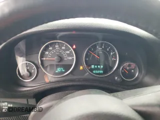 2013 Jeep Wrangler Sahara with VIN 1C4AJWBG8DL691619, listed as a Copart auction lot 56194275 with 103,299 mi miles and Salvage title. Bid and sale history available at DreamBid. Image 9.