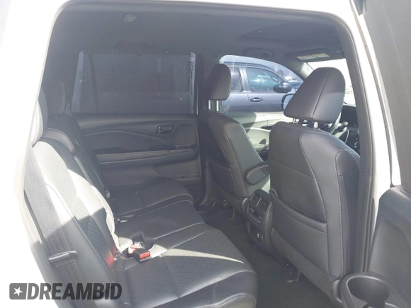 2023 Honda Passport Elite with VIN 5FNYF8H07PB010220, listed as a IAAI auction lot 41675730 with 25,128 mi miles and . Bid and sale history available at DreamBid. Image 8.