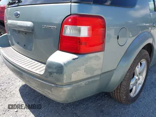 2005 Ford Freestyle Limited z VIN 1FMDK06195GA03291, wystawiony jako IAAI lot #42144008 z przebiegiem Nie podano mil oraz . Historia ofert i sprzedaży dostępna na DreamBid. Obrazek 15.