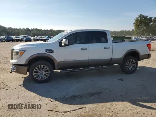 2016 Nissan Titan XD Platinum Reserve with VIN 1N6BA1F46GN506609, listed as a Copart auction lot 69445824 with 126,228 mi miles and Salvage Title. Bid and sale history available at carsss.com. Image 1.