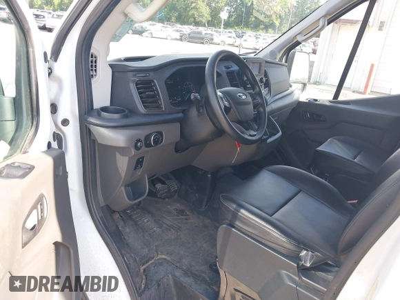 2023 Ford Transit Cargo with VIN 1FTBR1X81PKB46146, listed as a IAAI auction lot 42180262 with 75,169 mi miles and . Bid and sale history available at DreamBid. Image 20.