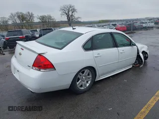 2014 Chevrolet Impala LT z VIN 2G1WB5E30E1140901, wystawiony jako IAAI lot #42106456 z przebiegiem 119 529 mil mil oraz . Historia ofert i sprzedaży dostępna na DreamBid. Obrazek 4.