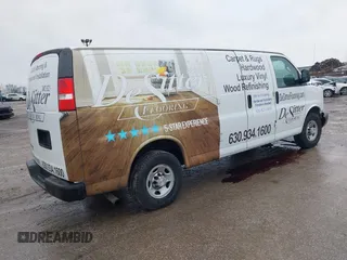 2016 Chevrolet Express Cargo Van with VIN 1GCWGBFF8G1135759, listed as a IAAI auction lot 41452031 with 96,893 mi miles. Bid and sale history available at carsss.com. Image 4.